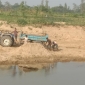 অবৈধভাবে বালু উত্তোলনে বিলীন হচ্ছে কৃষি জমি ও ঘরবাড়ি